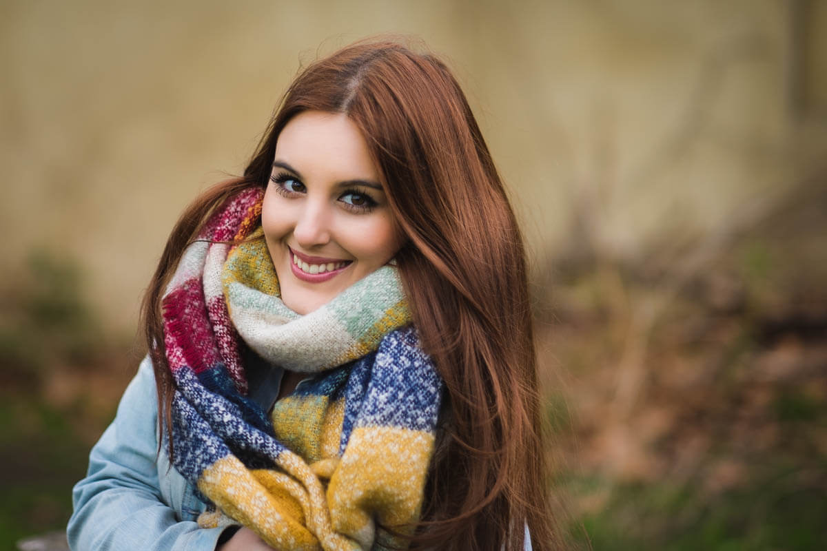 autumn portrait woman in big scarf